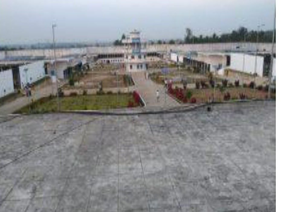 Aerial view across the Central Jail Shivamogga compound during construction.