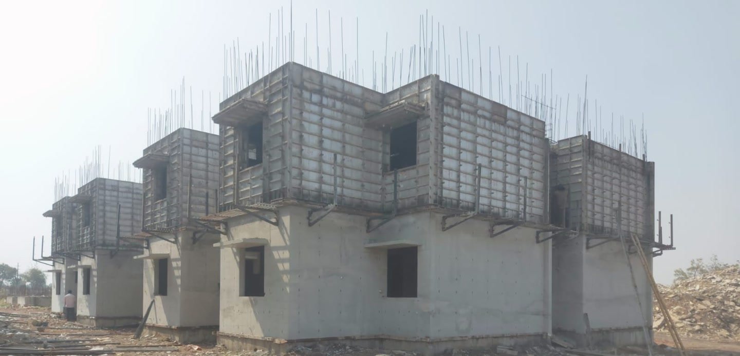 Government houses under construction at Talikoti with A.S. Betgeri aluminium centering in place.
